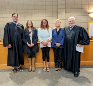 Court members posing for a picture. 